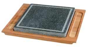 Hot stone set on wooden board