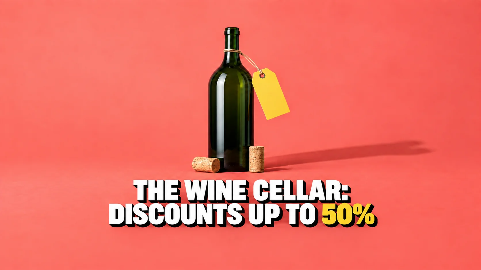 Unlabelled dark green wine bottle with a blank yellow tag on a coral background.