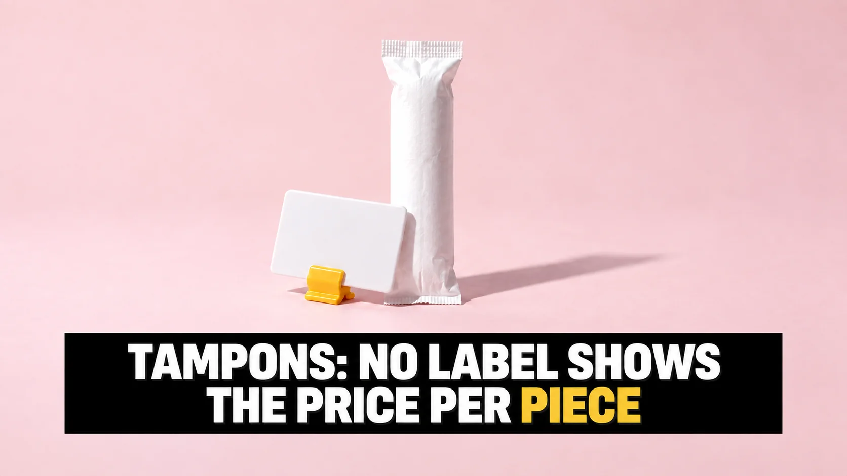 A tampon in a plain white wrapper beside a completely blank shelf-edge label