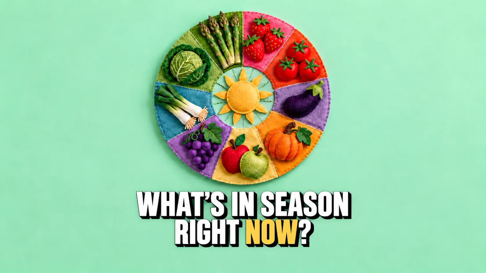 Seasonal wheel of felt and wool fruit and vegetables on a pale background.