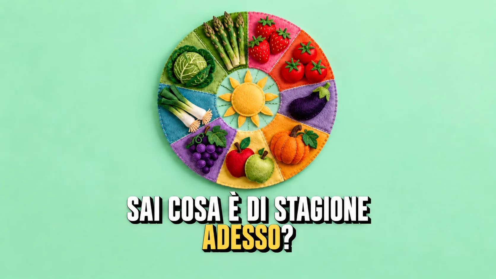 Ruota stagionale di frutta e verdura realizzata in feltro e lana su un fondo chiaro.